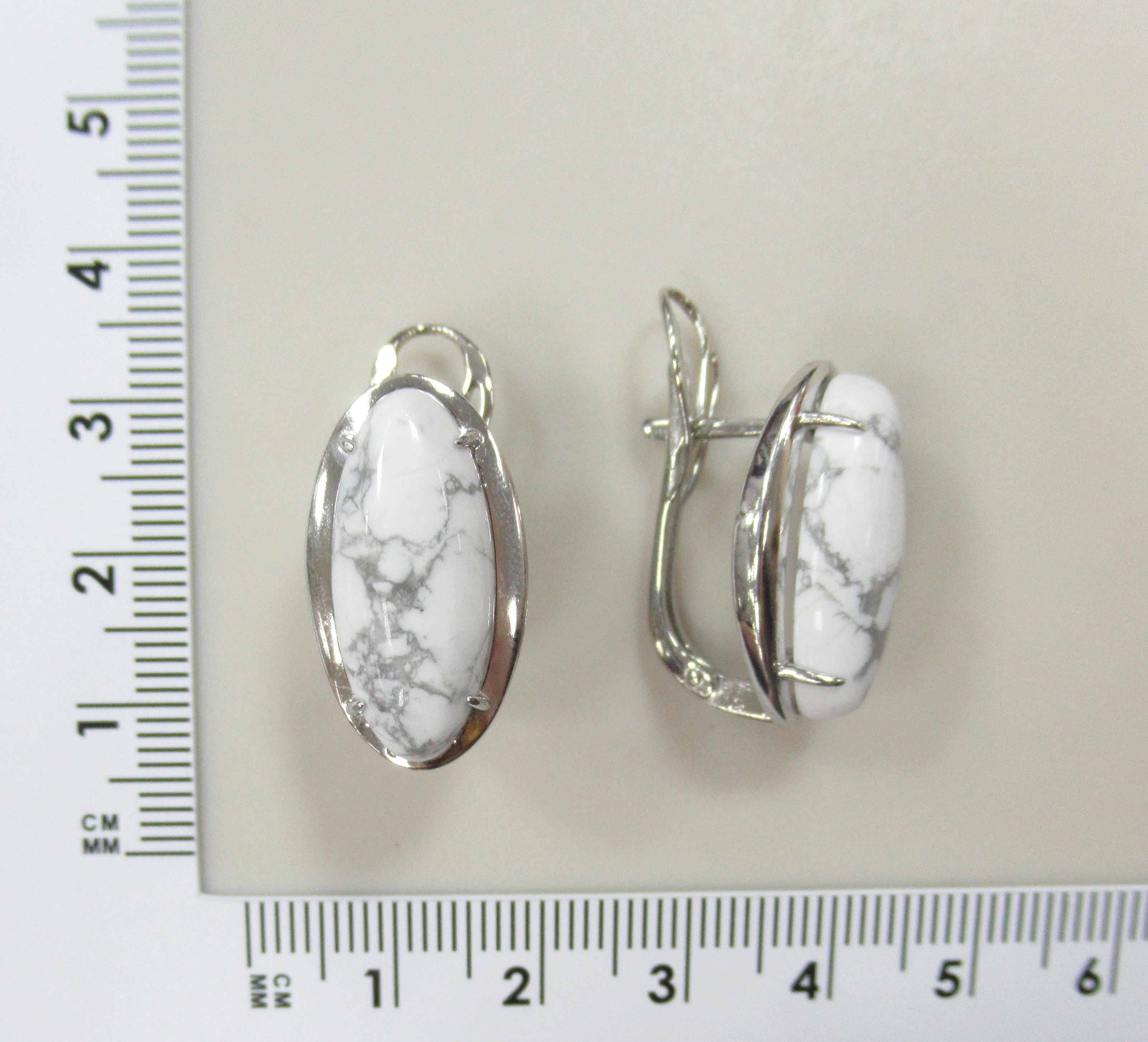 Серебряные серьги с кахолонгом